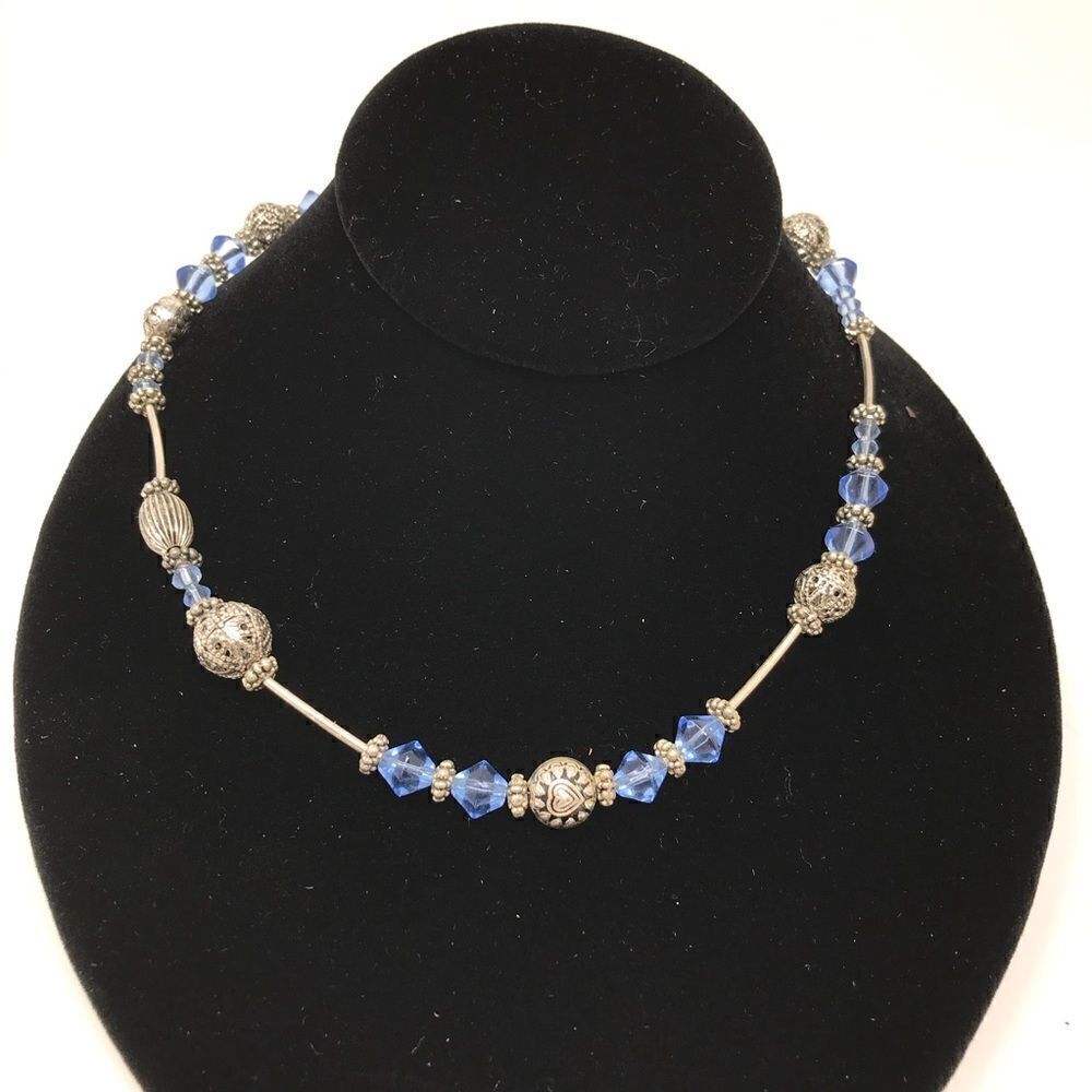 Blue and silver glass bead necklace.
